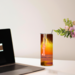 Tumbler on desk beside laptop, showing relaxing work-from-anywhere vibe